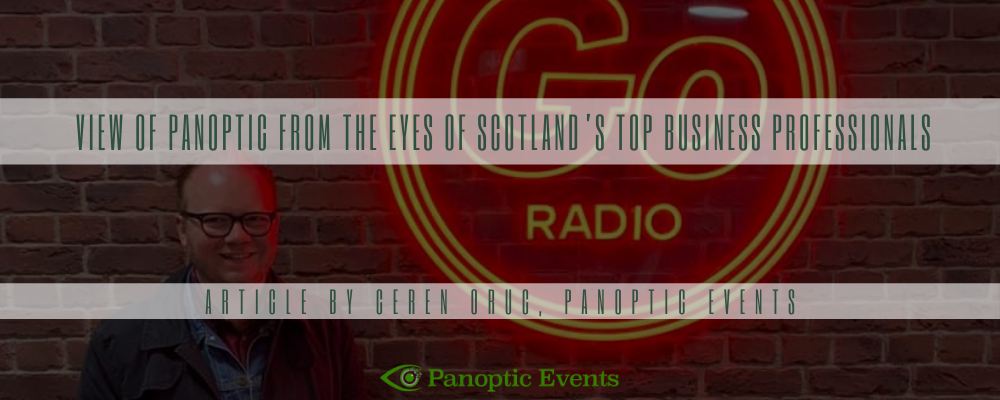 Craig McGee Standing at Go Radio Neon Sign in Glasgow