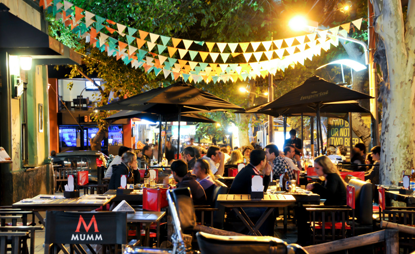 Av Arístides Villanueva, Buenos Aires Av Arístides Villanueva, Buenos Aires Busy street, outdoor dining