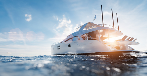 Catamaran motor yacht on the ocean at sunny day Hotel Motto Suite